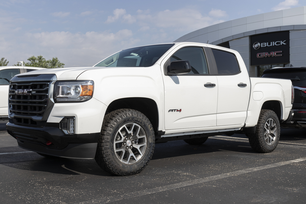 white 2021 gmc sierra 1500 left side angle view